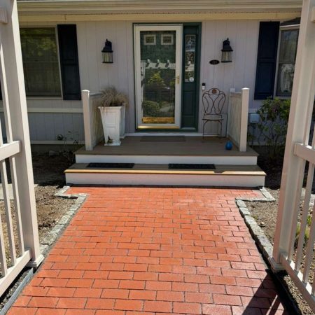 Red Brick Walkway with Cobblestone Edge
